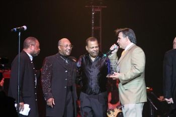 Grammy award winners Tavares is presented with the Miami Disco Fever Life Tine Achievement award by Producer Charlie Rodriguez
