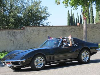 Parade with my son in our restored 1968 Corvette
