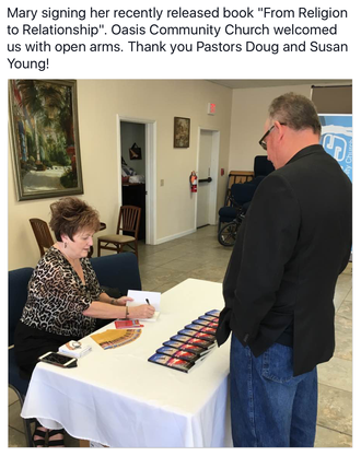 Mary Combs at book signing