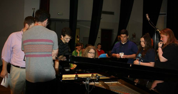 Some of Tracey's students looking on as she figures out an intro for the recording of the Alabama School of Gospel Music

