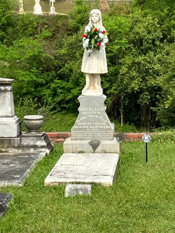 Little Martha gravesite, statue.

