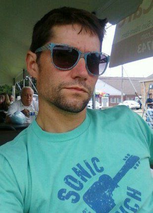 Rocking the Bank of Ann Arbor's Sonic Lunch shirt.
