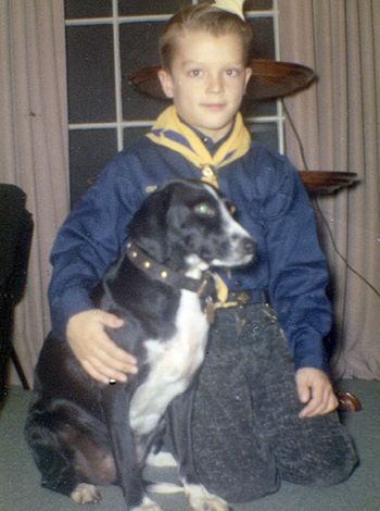 1960, age nine. Cub Scout with Blackie, all-time best pooch. The Scouts built character and integrity.

