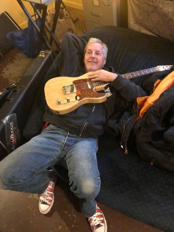 He's not 'laying down some tracks'...he's just laying down. Jim in the home studio (2021).
