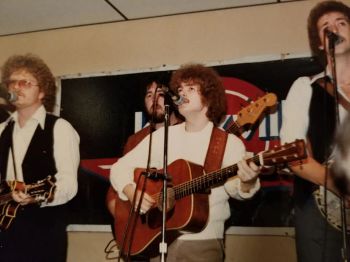 Darryl Wolfe (mandolin),  Gary Baker (bass), Mark Newton (guitar), Glen Laney (banjo)
