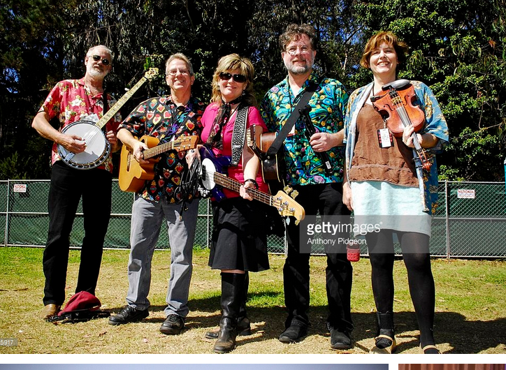 Hardly Strictly Bluegrass - Tom Pittman, Hank Card, Julieann Banks, Conrad Deisler and Darcie Deaville of The Austin Lounge Lizards pose for a group postrait backstage on Day 2 of the Hardly Strictly Bluegrass festival on October 3rd, 2009 in San Francisco, California, United States.
