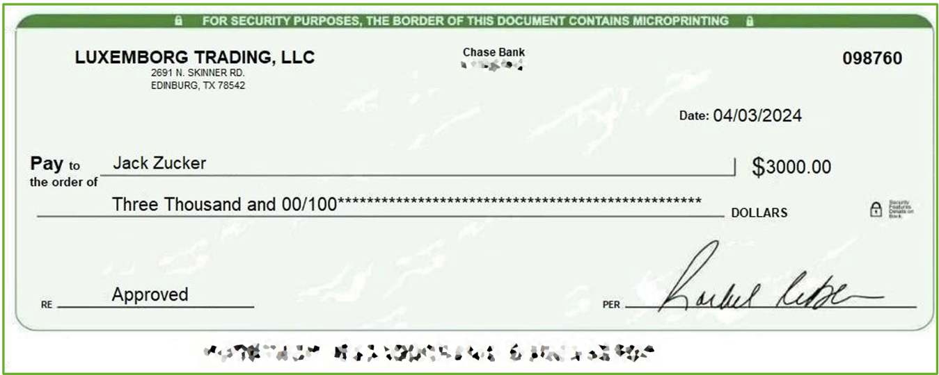 A close-up of a check

Description automatically generated