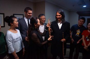 The largest musical instrument factory in China, Dun Huang, presents gift to Ron.
