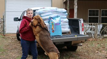 Joe won a contest - 1st prize! Can you see what he won?  That's right ...  1000lbs of dog food! January 2016
