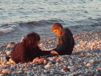 My young'uns, Aurora and Greyson, scoping out the rocks on the shores of Lake Superior, during the 2011 GMMAF!! Love you guys!