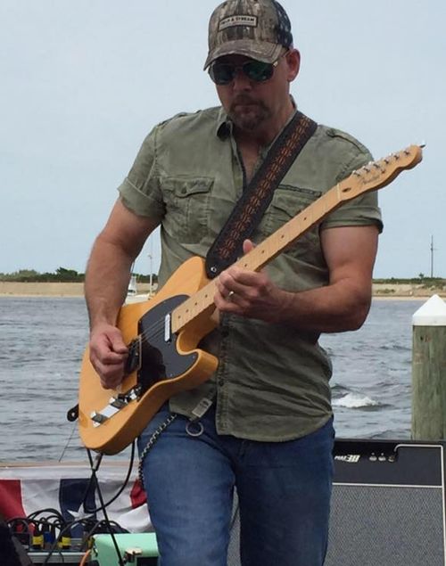 "Joe Young "JY", Lead/Rhythm guitarist. Though with his feet securely planted in the roots of classic Country, that didn't keep Joe pigeonholed as a performer. He later found himself touring with legendary hardcore band M.O.D. (Method Of Destruction).