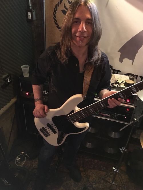A professor of music and a background in Rock (including auditions with the likes of Ozzy Osbourne and others), Dominick Tancredi is easily excited by things that go THUMP in the night, especially if it's got 4 strings or 5! He also loves a good double espresso.
