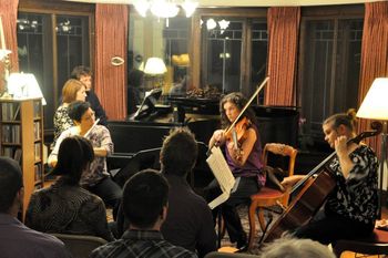 Arbor Ensemble at a private house concert and wine tasting. The program featured composers Haslinger, Turina, and Bridge, accompanied by wine and food of their respective homelands.