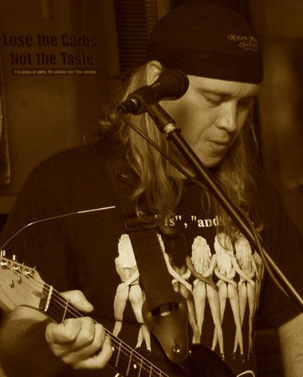 Chris Elliott - Guitar, vocals, bossman