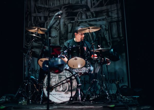Drums/Vocals - Available for bourbon clinics
Started playing drums at a young age playing in bands for many years. Whether its rock, country, kickin' blues tunes Ariel is the glue. Whatever sounds good and gets his heart thumpin' is fun to play. He joined up to help Ian hold down the beat for Whiskey Would as well as harmonies on the high-end. Come on out and say hey to Ariel and have a great time with Whiskey Would.
Let's hit the ground runnin'!!