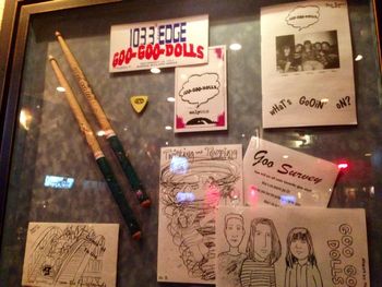 Here's the Goo Goo Dolls fan club promo stuff, drum stix, & guitar we donated to the Hard Rock Cafe Niagara Falls back in 1996. I created and drew those newsletters & one of the close ups of the newsletter is a black & white copy of a photo of Robby, me, Johnny, Sarah & Mike Goo. Also included is the hair of Mr. G Clinton in which I've performed with, too- so yes I've been in the music scene since a wee one & I'm still here bringin' tha action