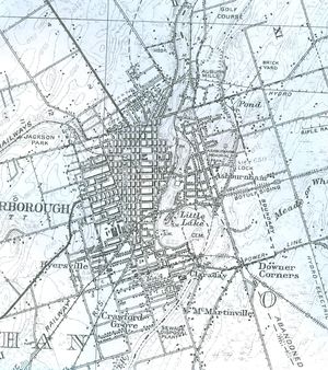 Archives of Ontario DND 1932 Peterborough Sheet 31D. The vertical series of dashes to the north represent the abandoned Peterborough & Chemong Lake Railway; and those to the south, that of the Cobourg & Peterborough Railway.