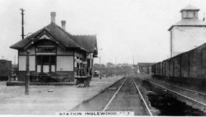 Mislabelled Post Cards. This card is captioned as Inglewood, Ontario, but even though there was an attempt to obliterate
the name board wording, railfans of the area will know it's a shot of the Grand Trunk Railway's Newmarket station. The only plausible reason for the deception is that the photographer received a post card order from an Inglewood retailer. Having no Inglewood station shots on
hand, he substituted this one and took great pains to label it accordingly. One wonders what the Inglewood merchant thought when he opened his box of cards, as it was certainly not an image his customers would recognize. Jeri Danyleyko Collection