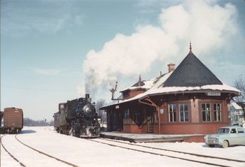 A well-publicized portrait of the handsome witch's hat station, as CPR #484 steams in with its caboose hop. 1957. Robert J Sandusky photo