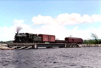 The Mixed is on its way back to Lindsay, crossing the little Bob Channel. The swing-bridge base can be clearly seen. 12 July 1957. John Rehor photo