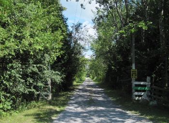 Looking north off River Road at what has become the driveway for a private residence. See middle black dot on the map.