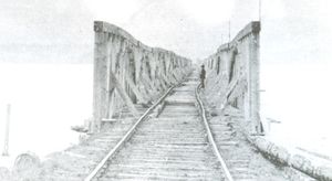 The ice has wreaked its havoc again and again on the the trusswork of the Cobourg & Peterborough Railway bridge across Rice Lake. It will not be long before the direct route to Peterborough will close for good. NAC PA 127491