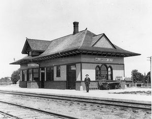 GTR Millbrook Jct. station sometime before 1927. The rails of the "Old Road" are in the foreground, with the tracks to Peterborough behind the building. Al Paterson Collection