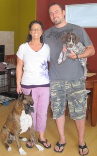 Our first family photo with Rex (our amazing boxer boy- RIP) and Miss Olivia, as an 8 week old baby.