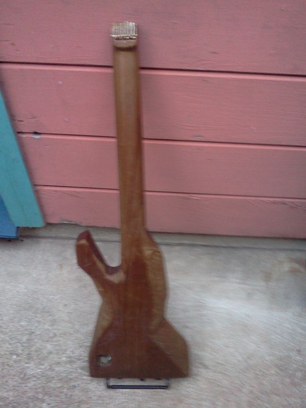 6/30/14 - #12 - Back view of another teak guitar. Number twelve has been my go to solid body electric and has been in DAEBF#D tuning for 3 years.