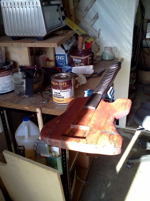 7/3/14 - #15 top side - The body got roughly shaped in and sanded over one time through. There are a lot of knots here, so I am giving the body a wash / sealer coat.