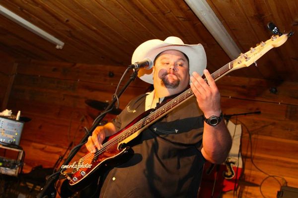 Eric Wayne - Vocals / Bass Guitar