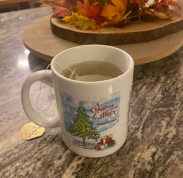 “A Christmas Gift for Esther” collectible mug. 🤶🎄
(Photo by MLD) 😊