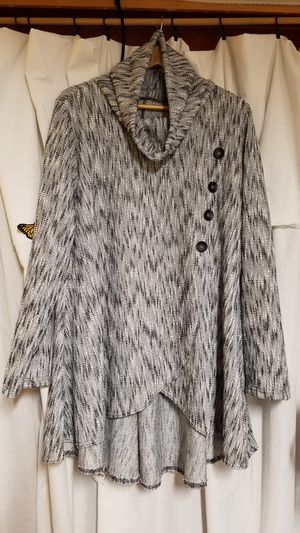 Knit garment with handmade buttons