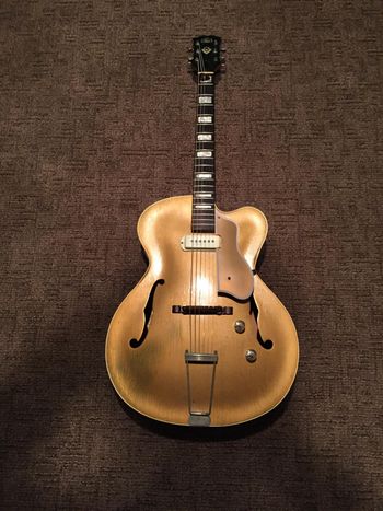 A student of mine brought this guitar to his first lesson. "I've had this since I was a kid. Who would want an old guitar like this?" ME.