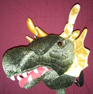 First we have Cadfarch the green, who roars. He joined us while the group was having dinner together one day, after an exhaustive search for the dragon with the right personality to join us.