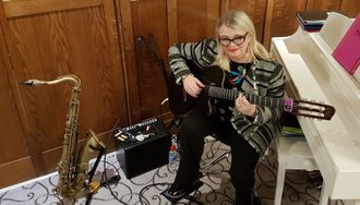 Guitarist playing at St Brelade's Bay Hotel, Jersey