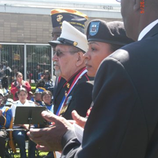 With granddaughter Army Specialist Brittney Mckenzie during the Gold Medal Ceremony