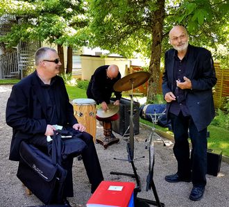jazz quartet packing up after wedding drinks gig