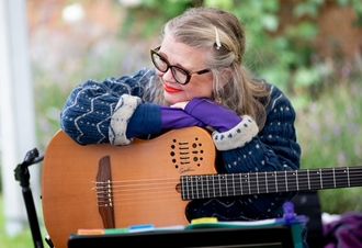 smiling guitarist at wedding ceremony gig