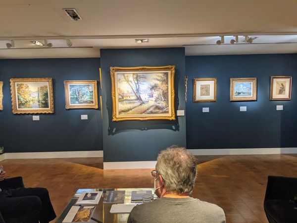 A wall of generations of Pissarro pieces
