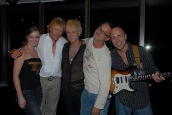 95.5 KLOS FM stars Mark & Brian from the "Mark & Brian" show pose for a picture with Mira, Jimmy & Gary.