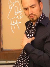 Jason Martinez, a flamenco dancer and cajón player, found flamenco through the dance program at the University of New Mexico, with instructors Eva Encinias-Sandoval and Pablo Rodarte. Having developed a genuine love for and dedication to flamenco, Jason traveled to Sevilla, Spain to study the art form. He has since studied extensively at the National Institute of Flamenco under Joaquin Encinias and Omayra Amaya and became an instructor for the Institute of both dance technique and cajón. Indeed, study with these accomplished instructors has made Jason a talented instructor himself. Jason became an original member of Yjastros, The American Flamenco Repertory Company in January 2001 under the direction of Joaquin Encinias. He performed with the company in nine concert seasons including tours of the Southwestern United States. He became a soloist for the company in Fall 2005. Jason now resides and teaches in Tucson, AZ and has toured nationally as a soloist.
Jason is an example of an artist cultivated through the New Mexican flamenco movement. He is joined in this group by other accomplished flamencos such as Gabriel Osuna, Vicente Griego, and Ricardo Anglada. One review states: "Pieces like Farruca, with principal dancer, Jason Martinez, carry the dance to a transcedental level – Martinez shuffles his feet to the point that he almost hovers just above the surface of the stage." - El Valle Hispanic News