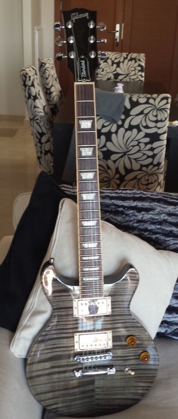 LES PAUL STANDARD DC. This guitar was a real find! . . . I spotted it a Swedish music store a couple of years ago, covered in dust but "brand new" . . . It still has the plastic on the back too. I didn't pay that much for it, because at the time the pound was ultra strong!