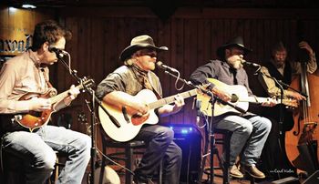 L to R: Ryan Murphey, Michael Martin Murphey, and Chuck Hawthorne at the Saxon Pub Austin, TX. Photo by Carol Viator