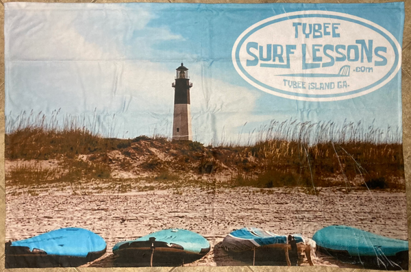White Tybee Surf Lessons logo printed on a fully colored 40" x 60" Beach Towel. (50% cotton, 50%) cotton. $45
"TSL Lighthouse Towel"
*Color in demo picture may vary from actual towel color.
