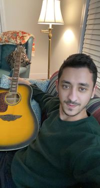 This is Hamid with our 1st Guitar Resettlement!