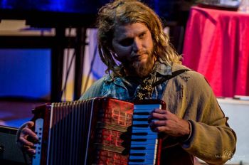 Dillon Broxon killing it on the accordion in The Journey, New Orleans Fringe Festival. Photo by Michelle Stancil