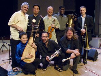Burning Bridge, 1st Row, L to R: Sun Li, Taylor Ho Bynum, Andrew Drury. 2nd Row, L to R: Ken Filiano, Wang Guowei, Joe Daley, Steve Swell - photo by Scott Friedlander
