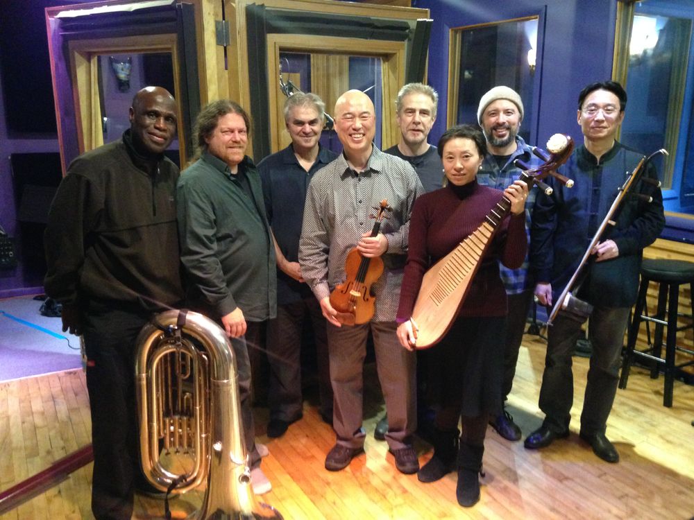 Burning Bridge at Kaleidoscope Sound, Union City, NJ after recording Blood. L to R: Joseph Daley, Andrew Drury, Ken Filiano, Jason Kao Hwang, Steve Swell, Sun Li, Taylor Ho Bynum, Wang Guowei