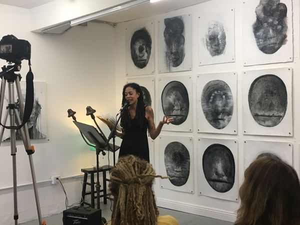 Licity Collins live at the basic premise gallery reading The Fallng at an event featuring Lydia Lunch